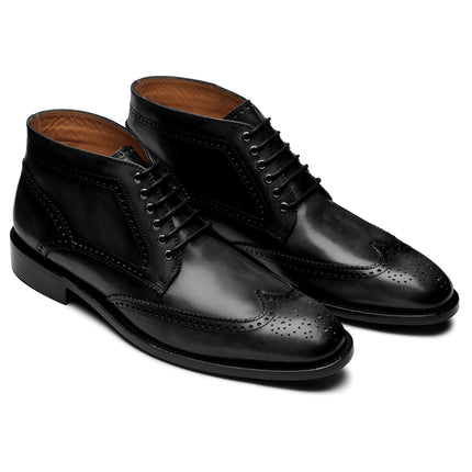 Men´s black leather wingtip brogue boots